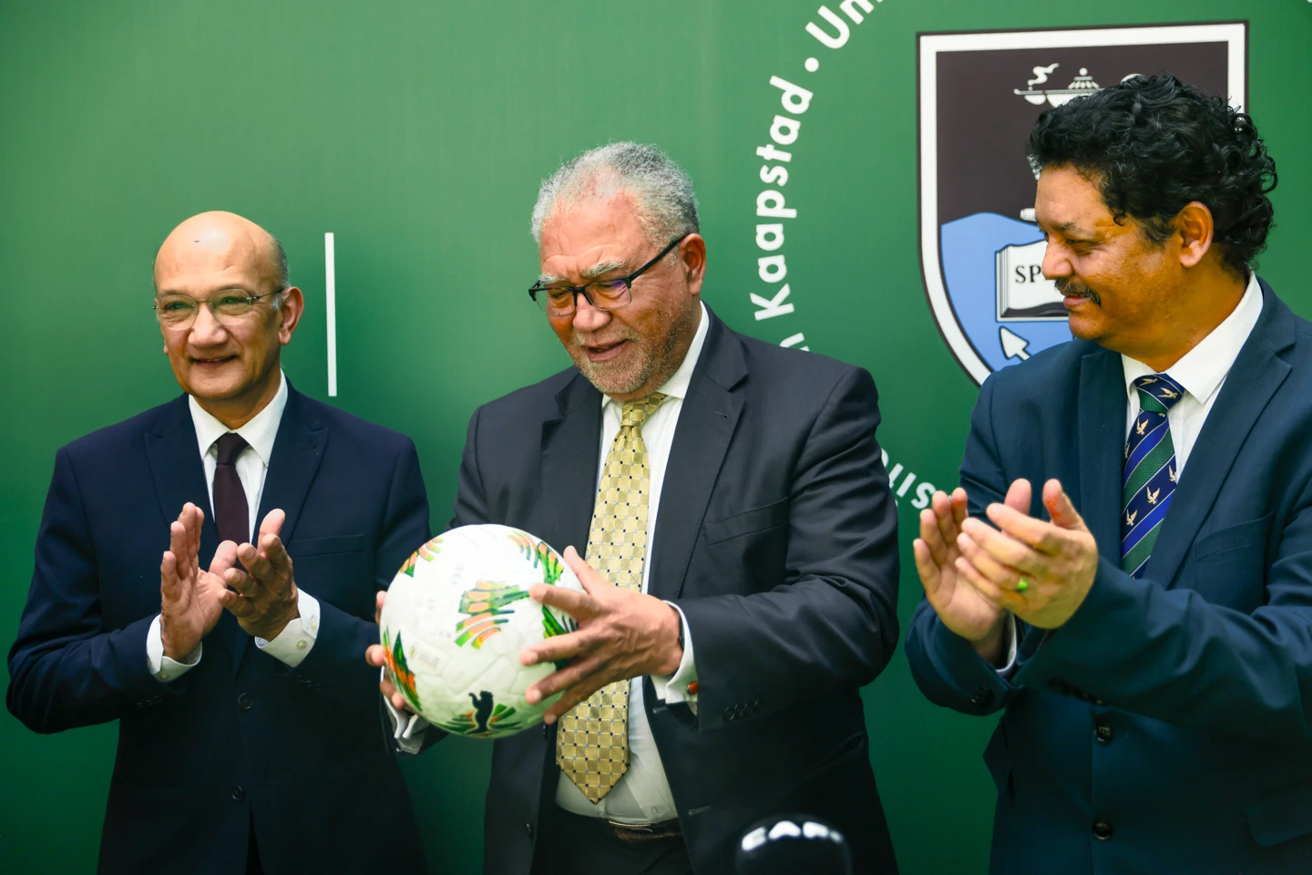 UCT Chair of Council, Norman Arendse SC holding football